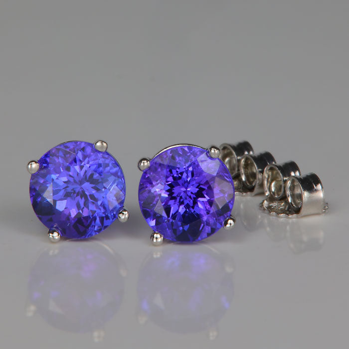 white gold tanzanite stud earrings round brilliant cut