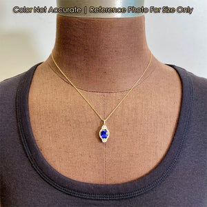 size of yellow gold oval tanzanite diamond pendant 