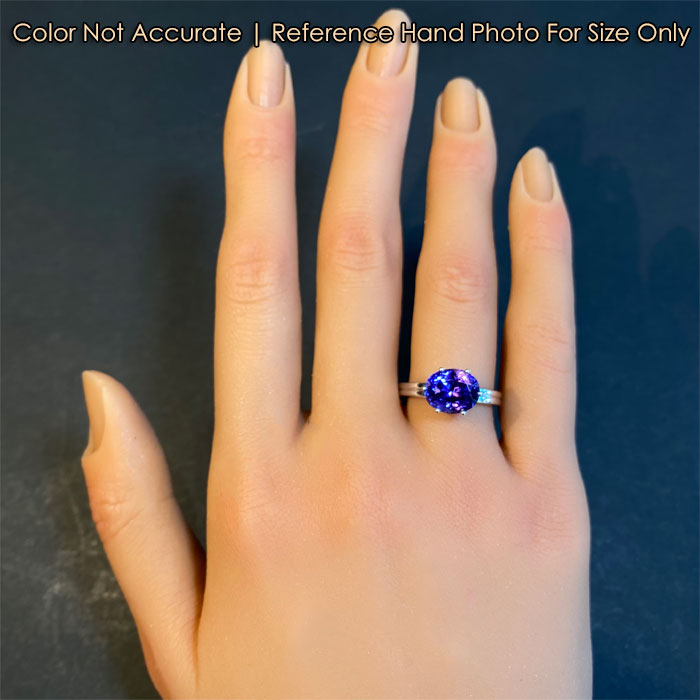 tanzanite ring on hand white gold oval cut 