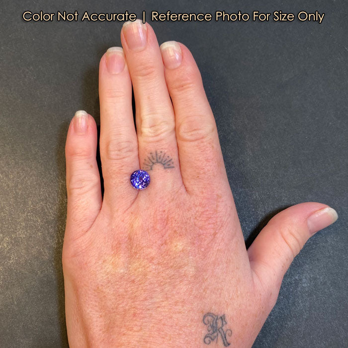 size of tanzanite gem to hand