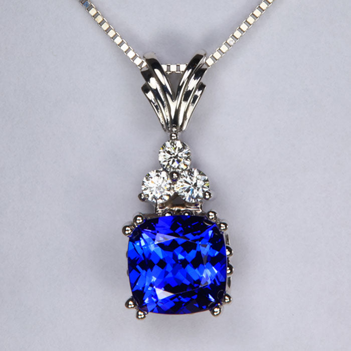 square cushion tanzanite pendant white gold diamonds