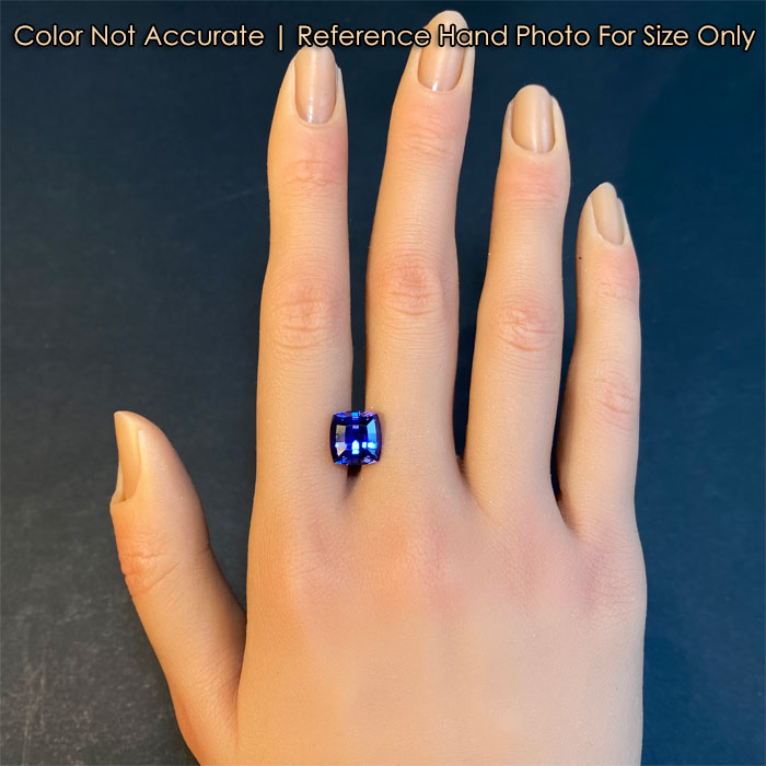 tanzanite gemstone on hand 