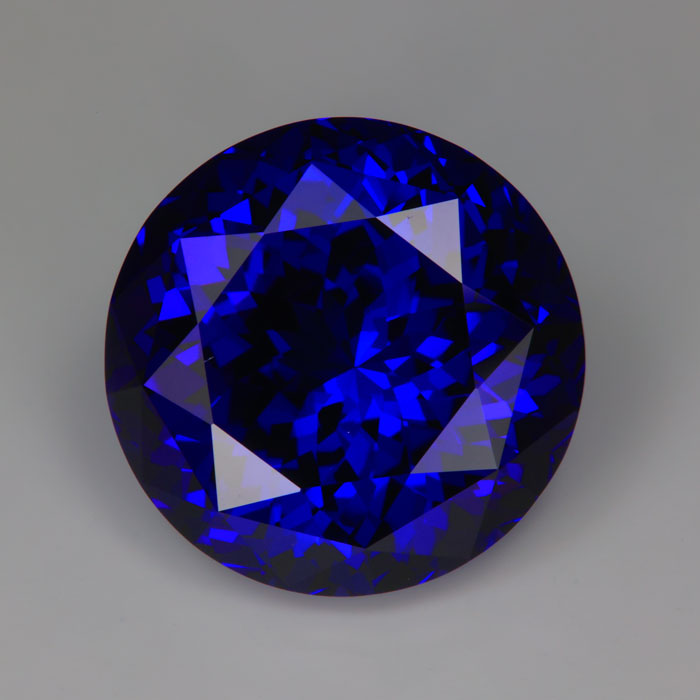 big beautiful tanzanite gemstone with red flash