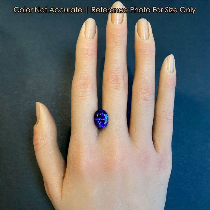 tanzanite gemstone on hand oval cut