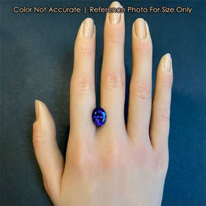 tanzanite gemstone on hand oval cut