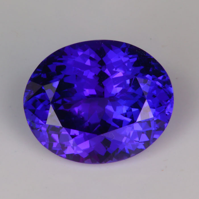 oval cut mostly violet tanzanite gemstone 