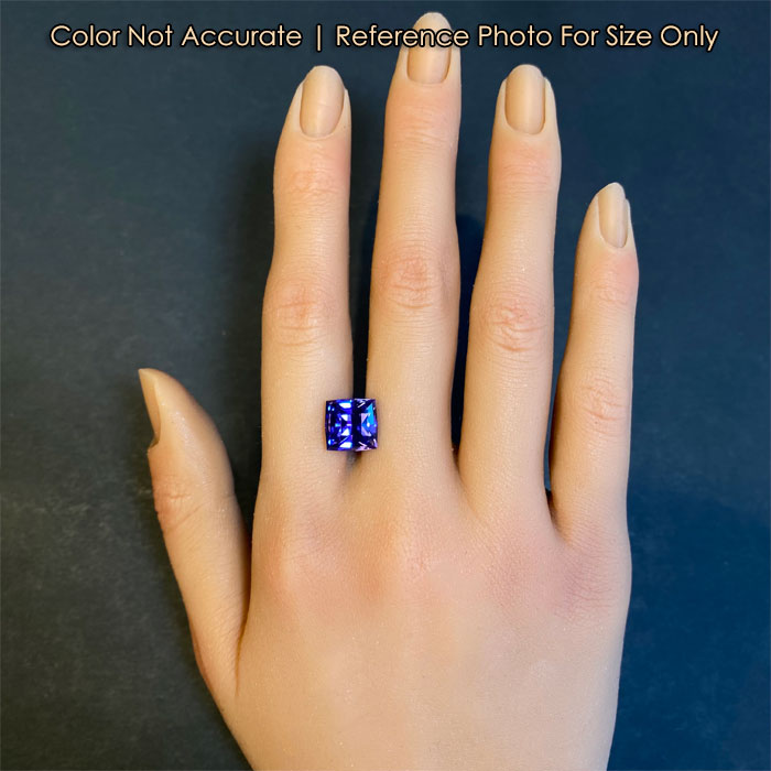 beautiful tanzanite gemstone on hand 