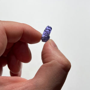 tanzanite crystal specimen in hand