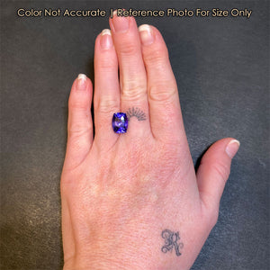 tanzanite size to hand 