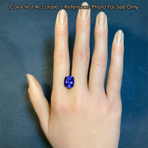 blue violet antique cushion tanzanite on hand size
