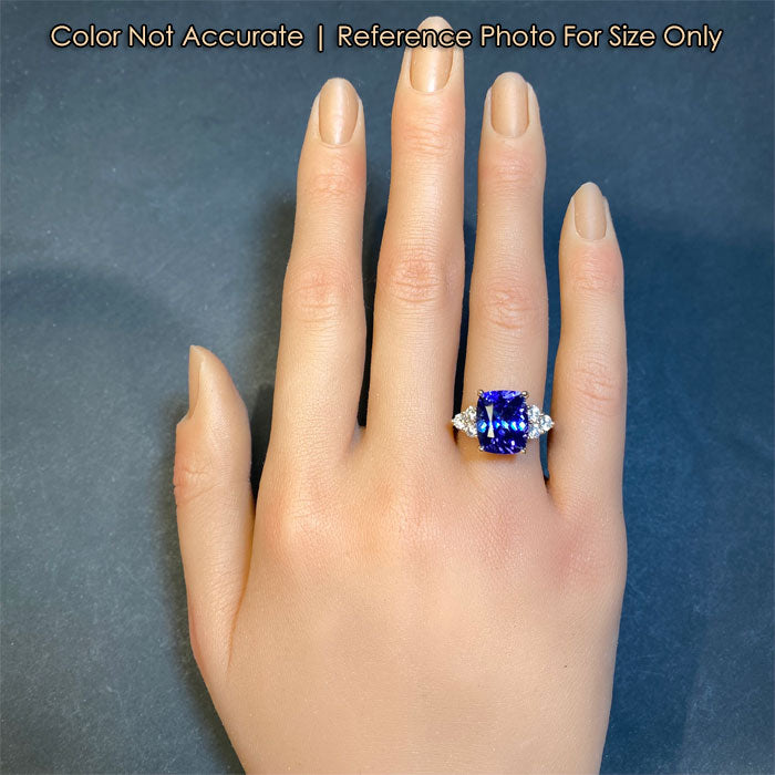 size of tanzanite and diamond ring to hand