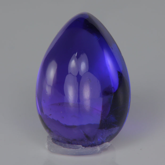 blue violet tanzanite cabochon cut gemstone