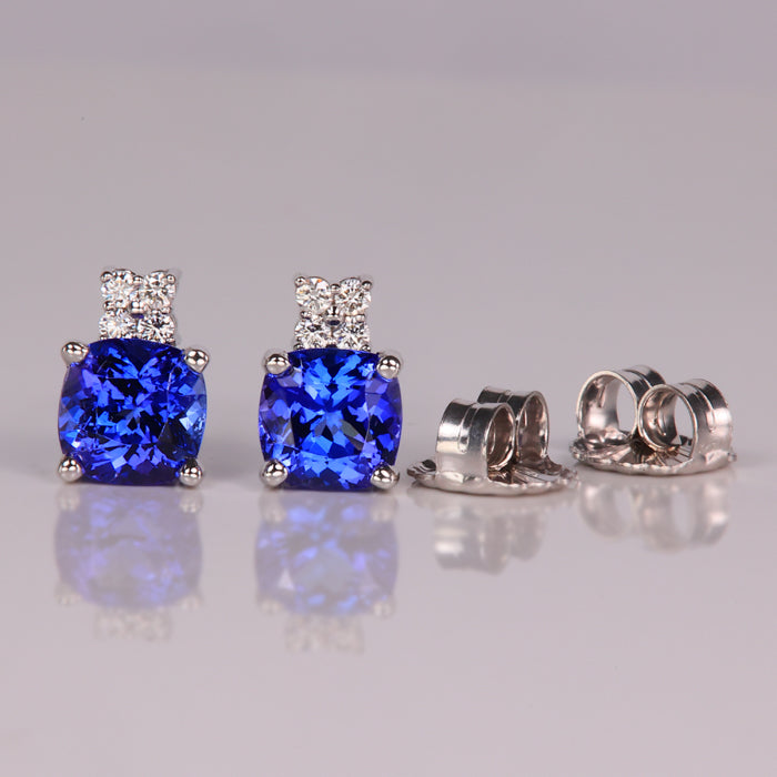 blue tanzanite gemstone earrings in white gold with diamond accents