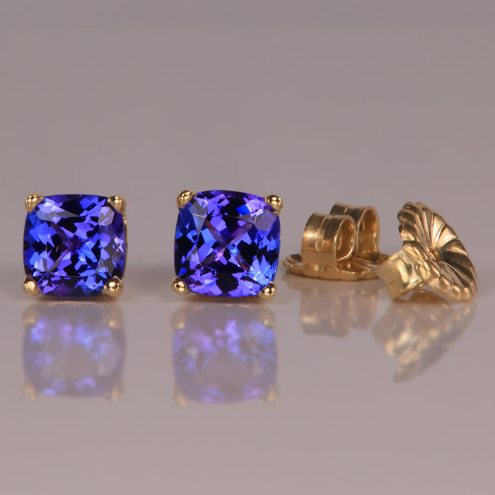 square cushion violet blue tanzanite stud earrings in yellow gold