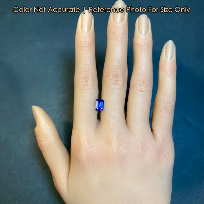tanzanite gemstone emerald cut size to hand