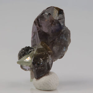 raw natural tanzanite and diopside crystal