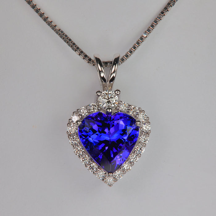 blue violet heart tanzanite gemstone pendant with diamonds in white gold