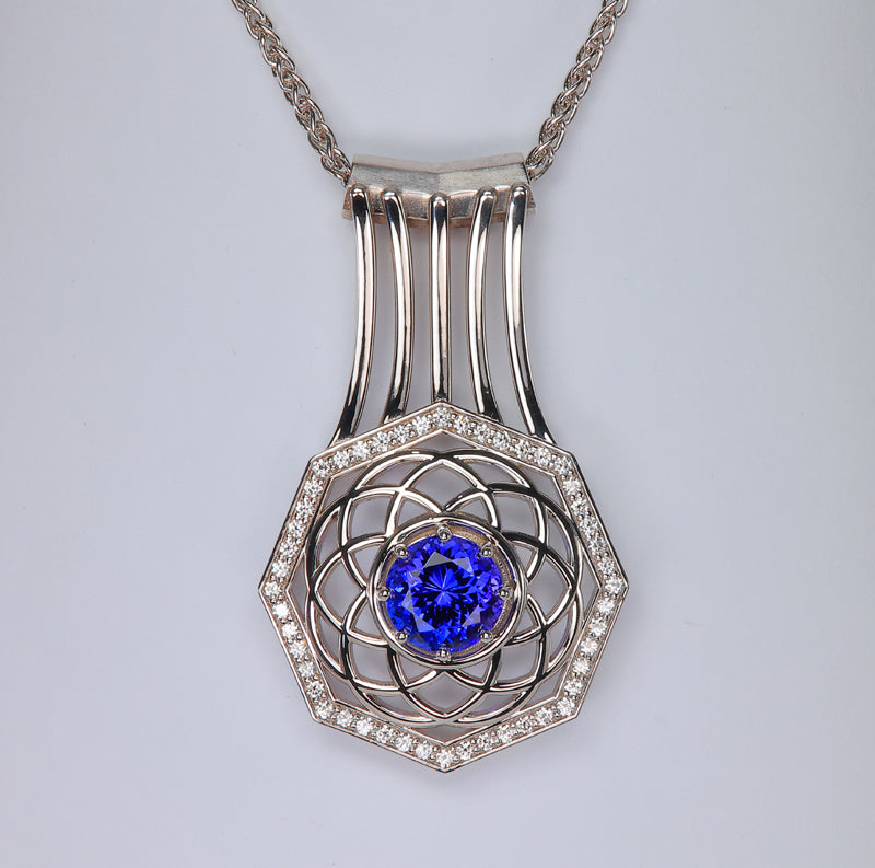 tanzanite and white gold pendant with diamonds