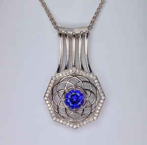 tanzanite and white gold pendant with diamonds