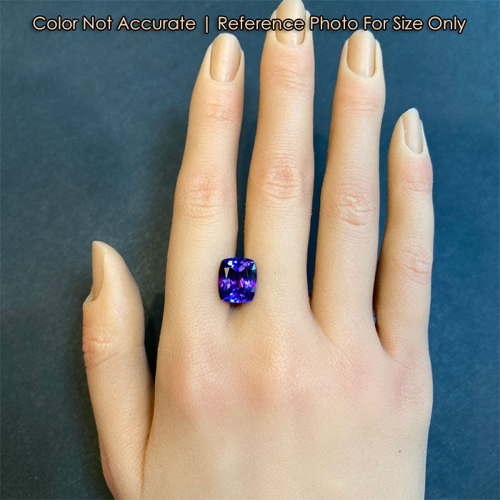 tanzanite gem antique cushion cut violet color on hand