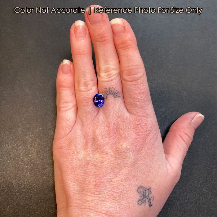 size of oval tanzanite on hand