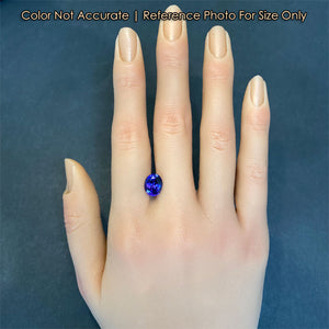 size of blue color oval cut tanzanite gem