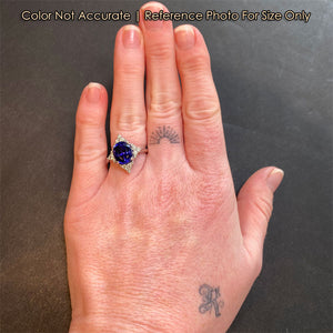 oval cut white gold tanzanite ring with diamonds 