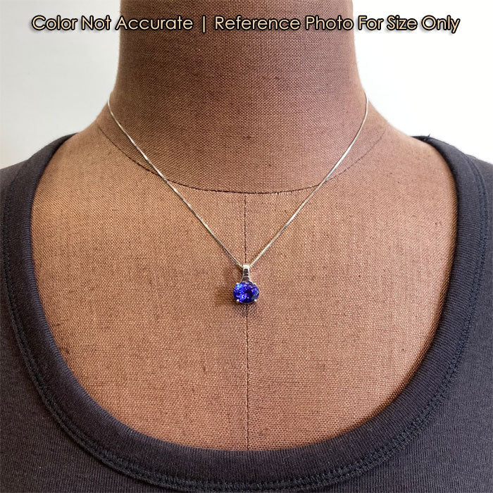 blue violet oval cut tanzanite and white gold pendant