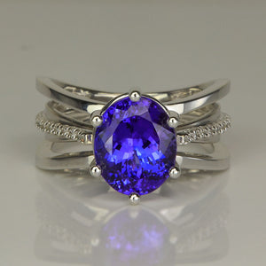 tanzanite gemstone ring oval cut with diamonds