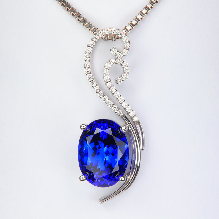 blue oval tanzanite pendant with diamonds white gold