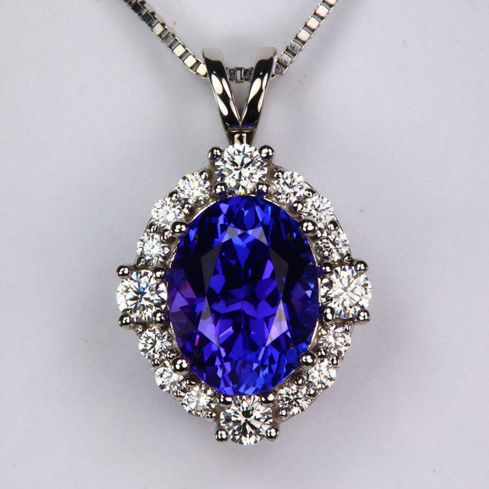 oval cut blue violet tanzanite gemstone pendant with diamonds 