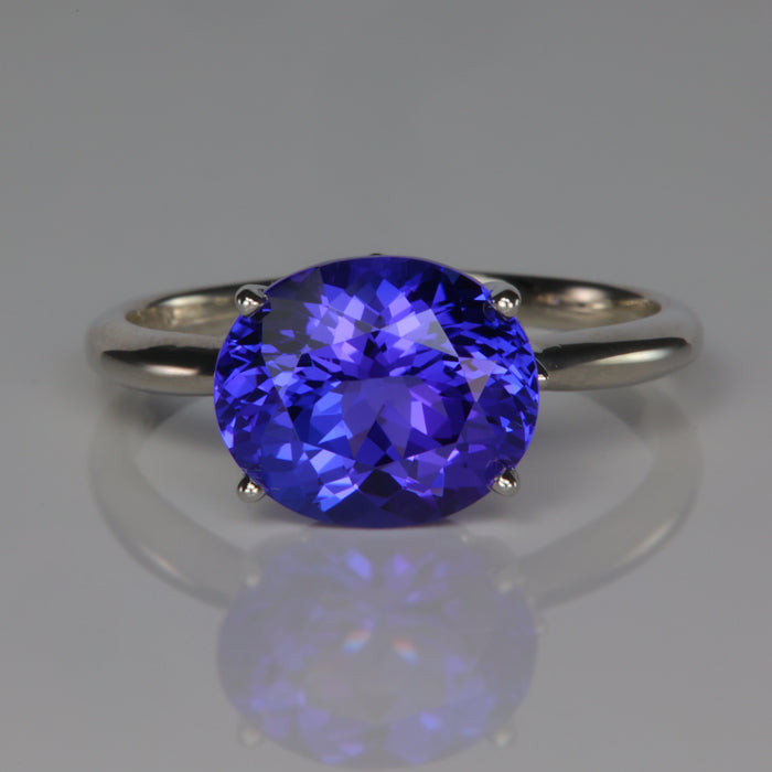oval cut blue violet tanzanite gemstone ring in platinum