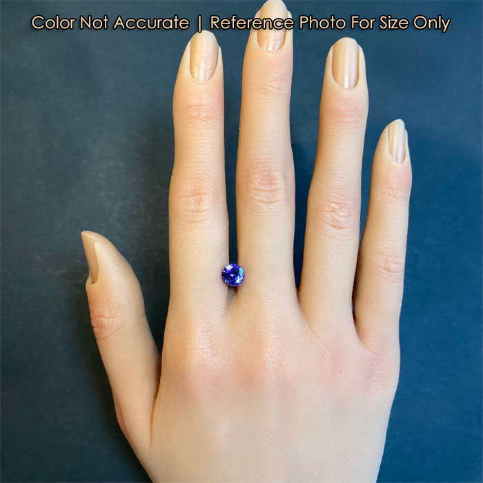 tanzanite gemstone round brilliant cut on hand for size