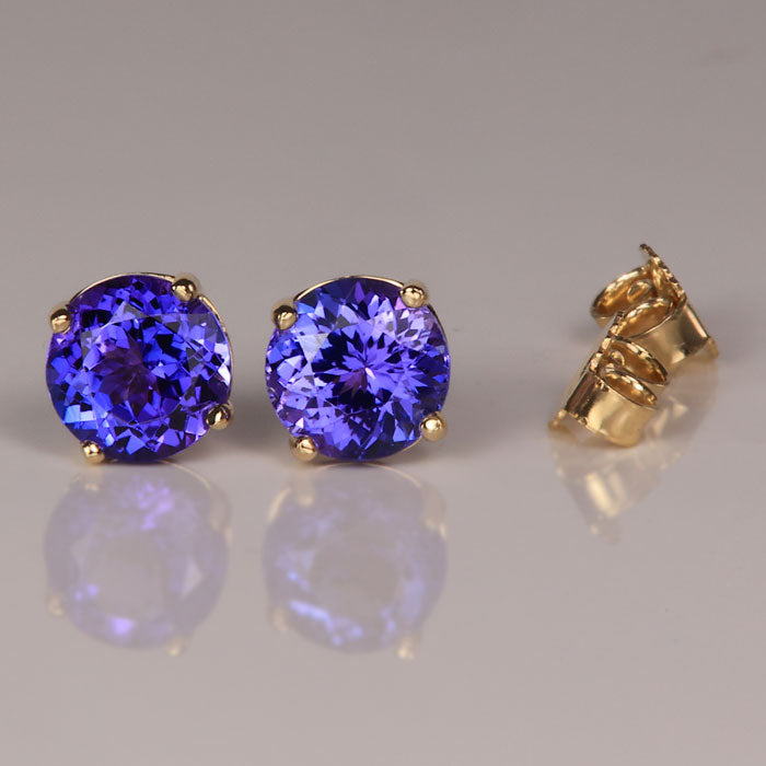 blue violet tanzanite yellow gold stud earrings 