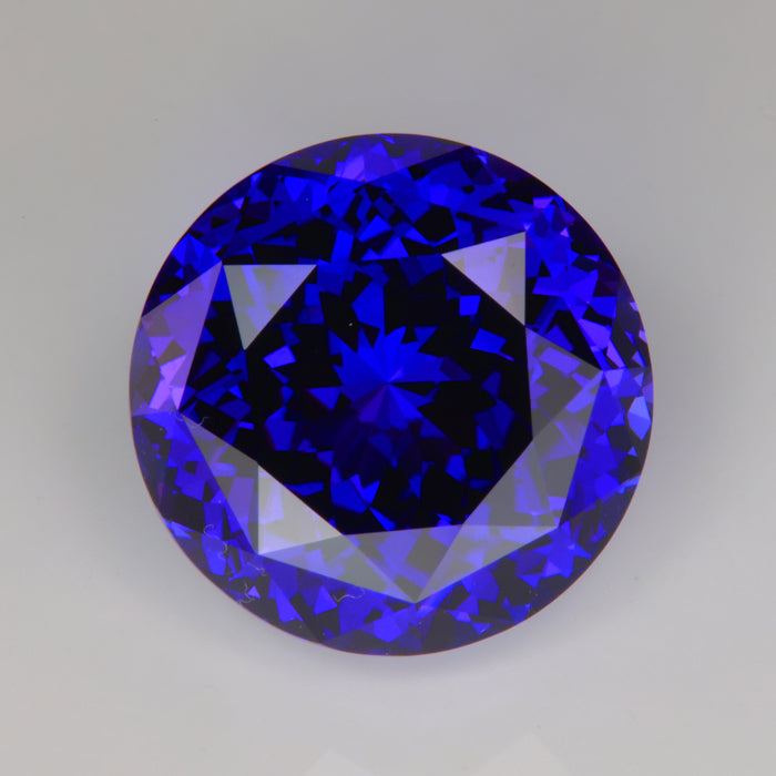 Round tanzanite gemstone with red flash large beautiful