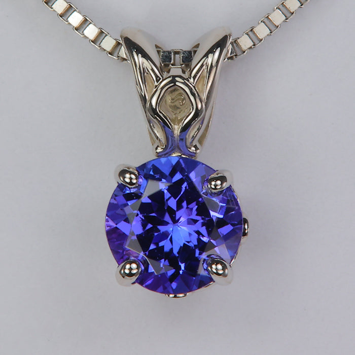 blue violet round brilliant tanzanite gemstone pendant in white gold 