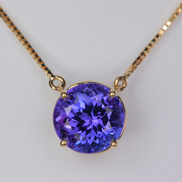 blue violet round brilliant tanzanite gemstone necklace with yellow gold box link chain