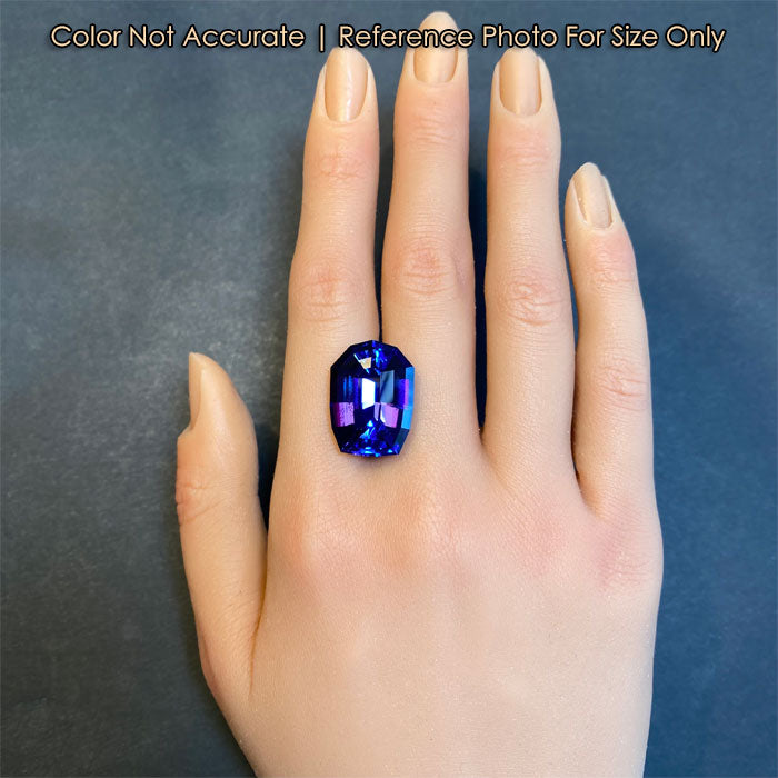 size of beautiful large tanzanite gem on hand
