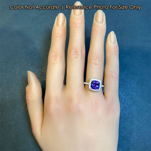 blue violet tanzanite gemstone ring with diamonds
