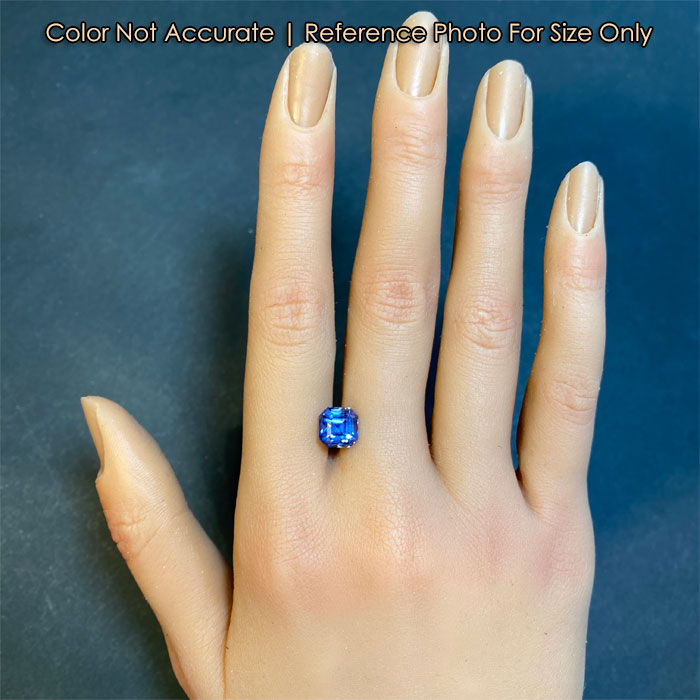 size of tanzanite on hand square step cut