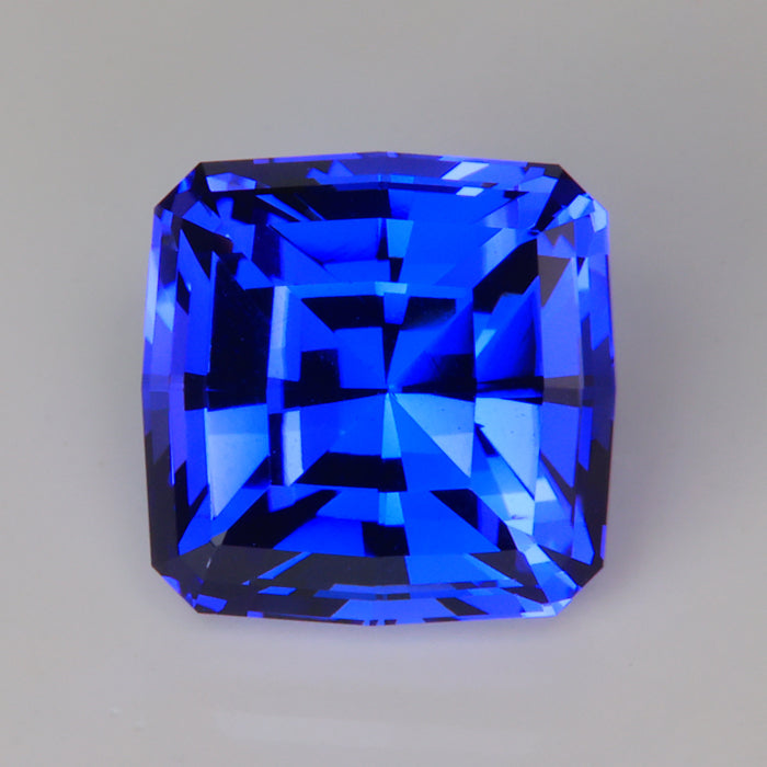 mostly blue square cushion cut tanzanite gem