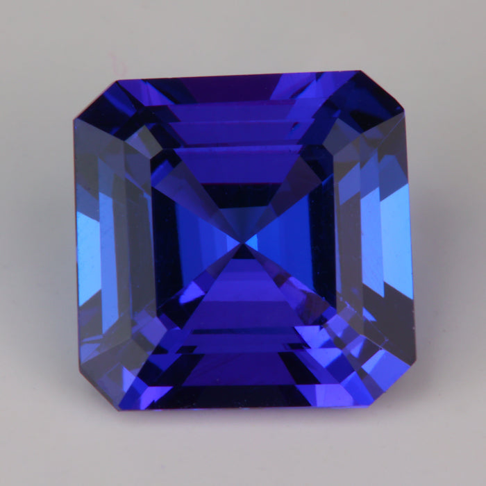 blue and violet tanzanite gemstone square step cut