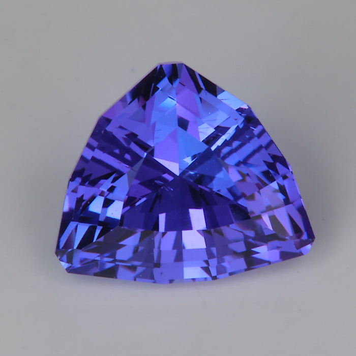 step triangle cut tanzanite gemstone blue and violet