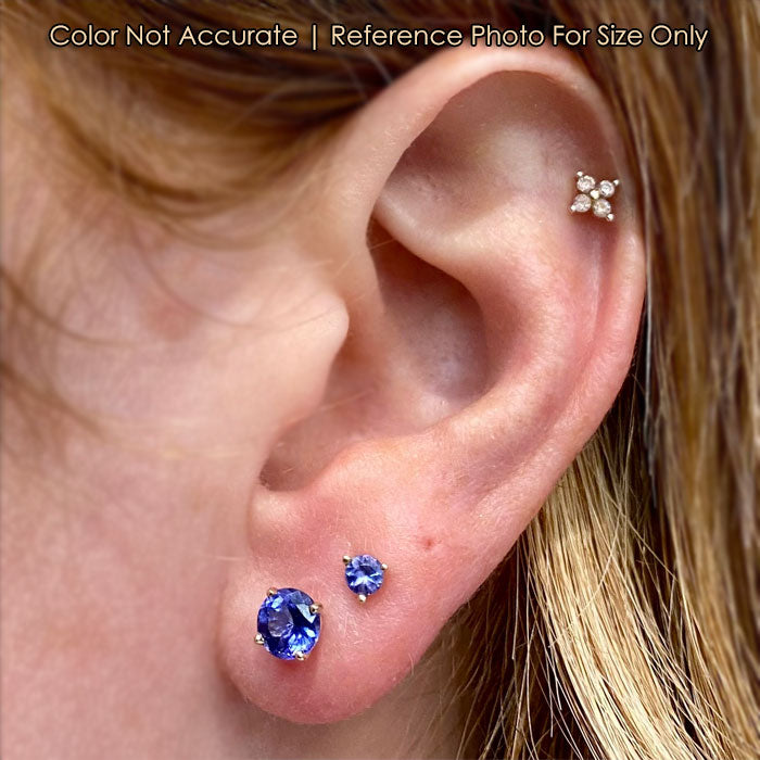 yellow gold tanzanite studs size