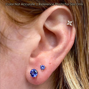 yellow gold tanzanite studs size