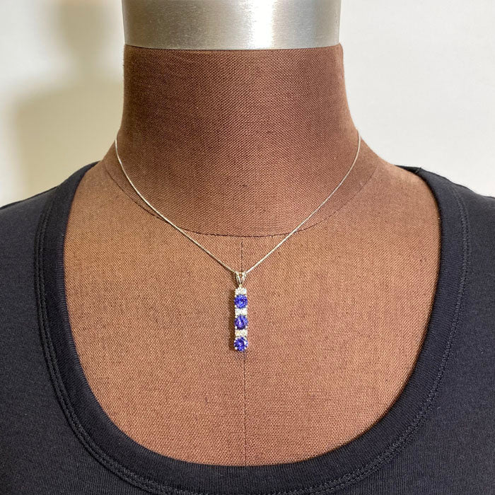 white gold and tanzanite pendant with diamonds