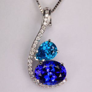 14k white gold tanzanite and blue zircon pendant