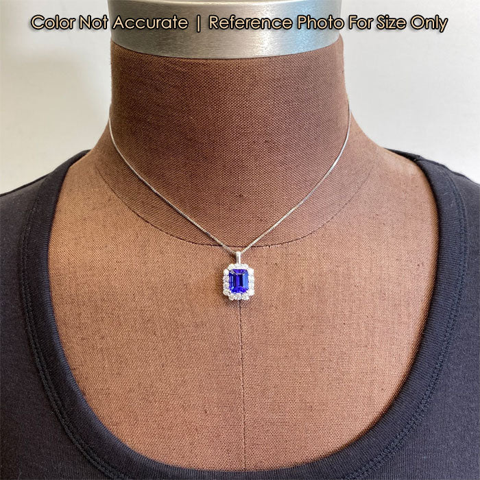white gold tanzanite and diamond pendant 