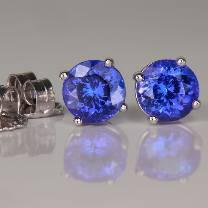 round cut tanzanite gemstone earrings yellow gold studs
