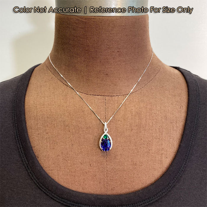 shield tanzanite with trilliant emerald gemstone pendant in white gold with diamonds 